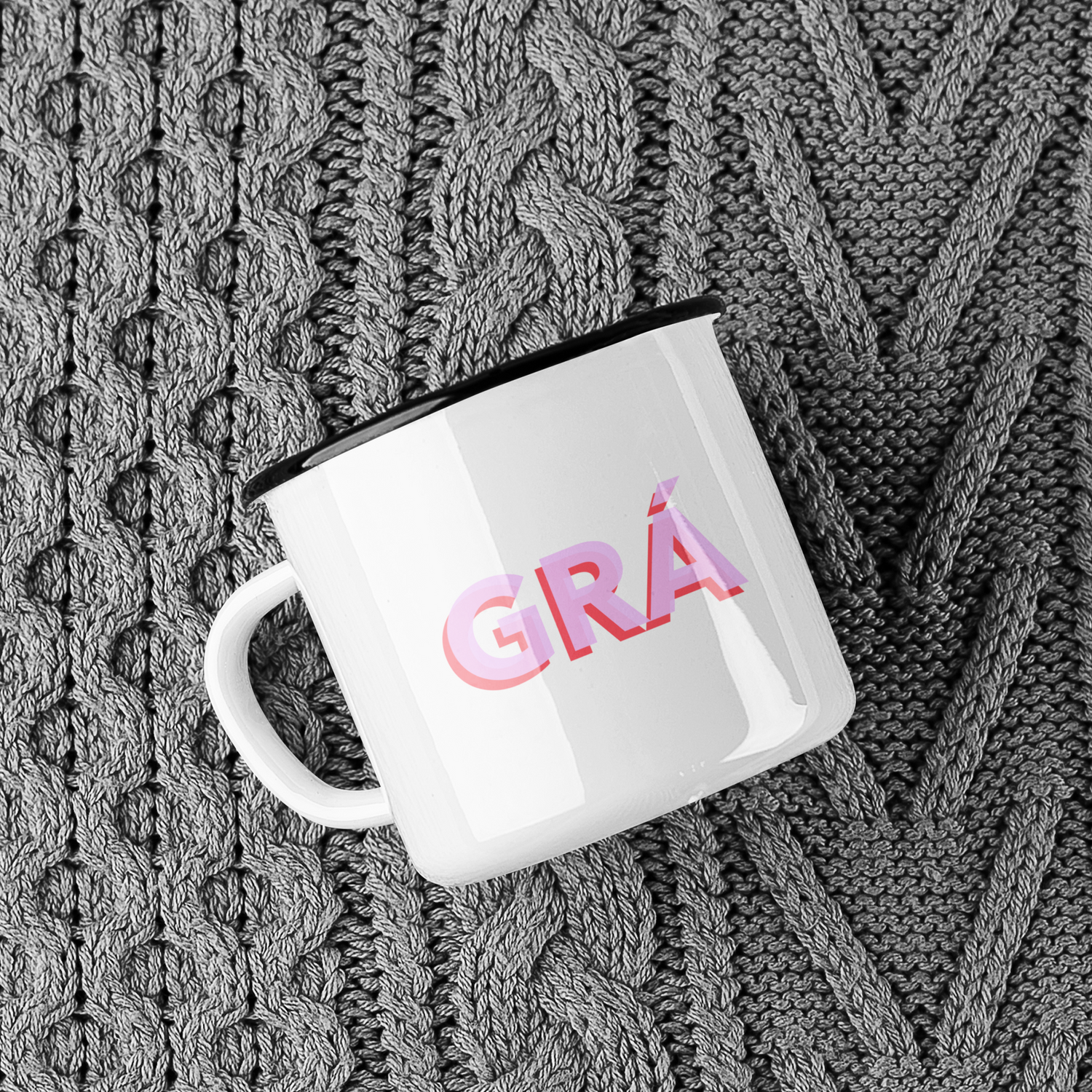 Contemporary enamel mug with Love - Gra design, perfect for Irish language enthusiasts. Lightweight and durable for hiking, camping, or morning coffee. Ideal gift for any occasion, combining functionality with a heartfelt message of affection.